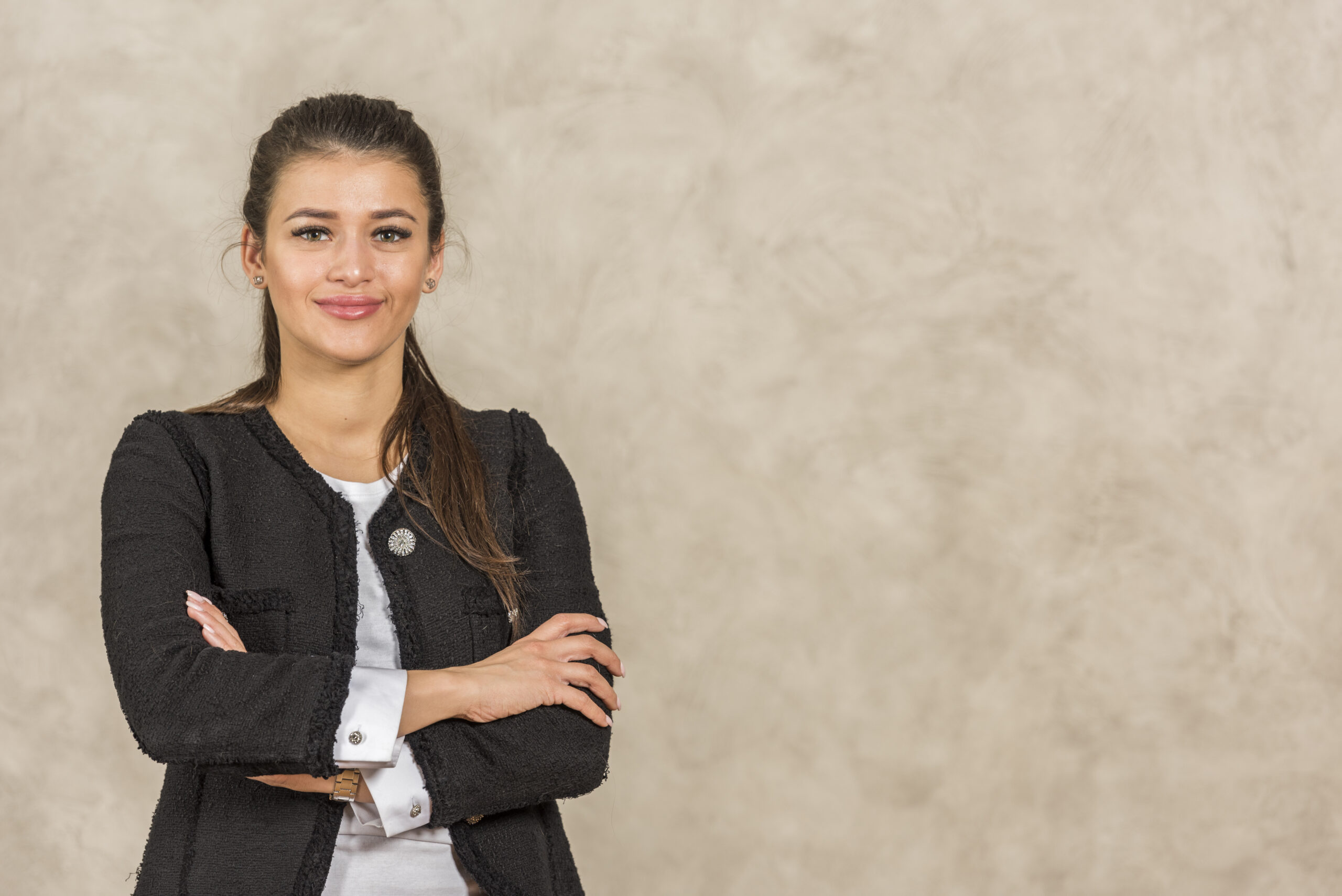 brunette businesswoman posing scaled
